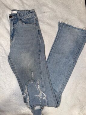 DOGMA Light Blue Distressed Skinny Jeans